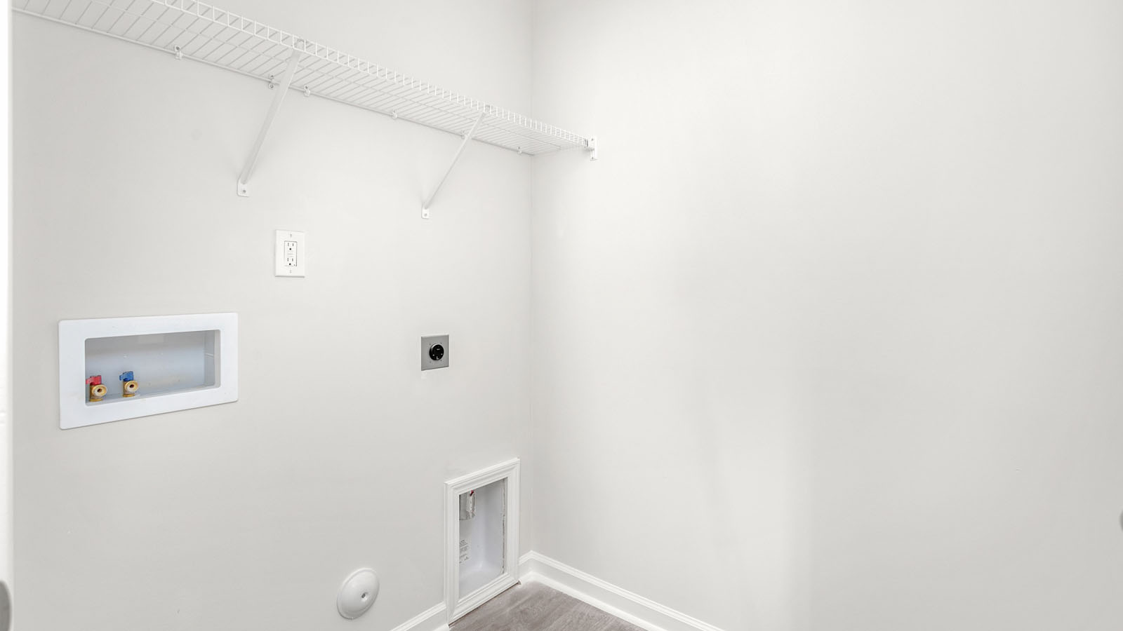 laundry room with wireshelving