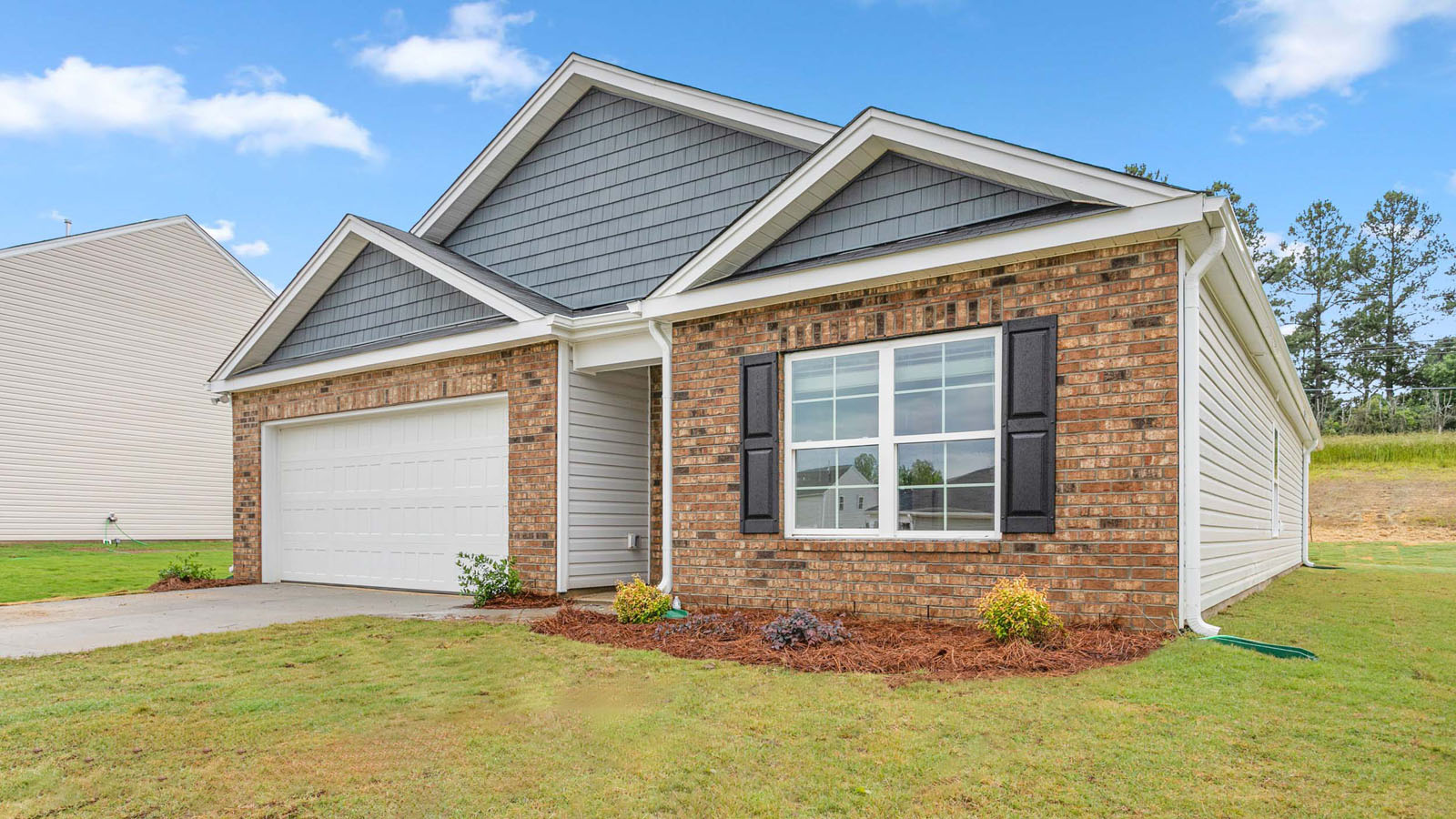 ranch with brick exterior