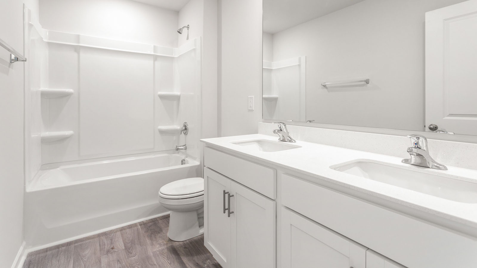 guest bathroom with dual sinks