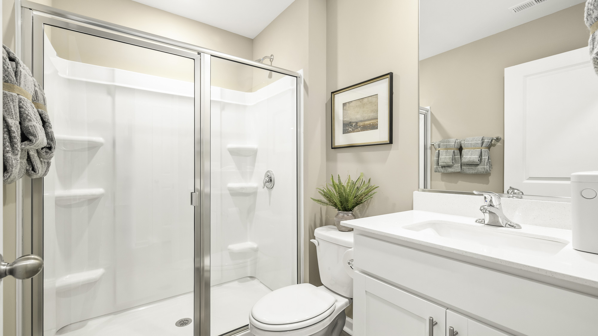 secondary bathroom with walk in shower