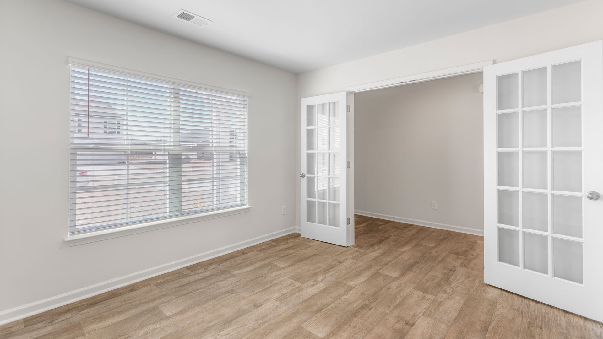 flex room with frnech doors