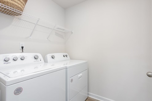 laundry room with shelfs