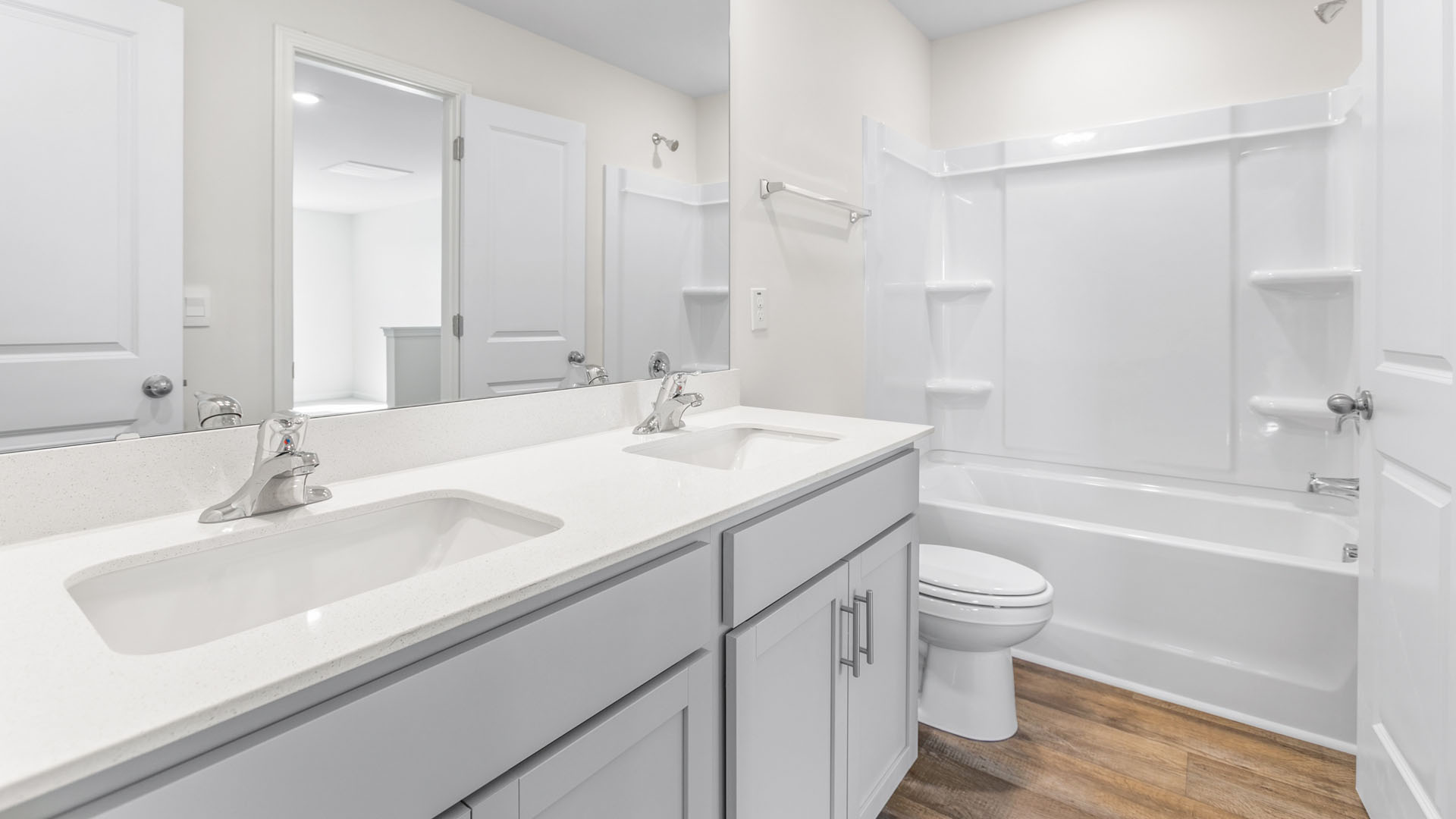 secondary en suite with tub shower