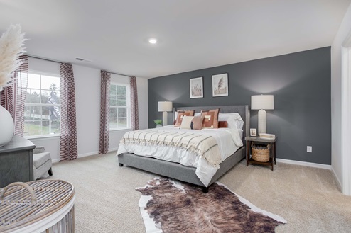 bedroom with carpet and natural light