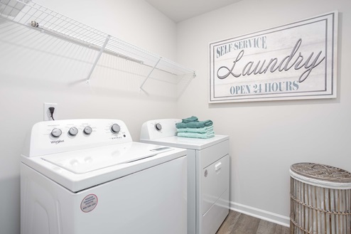 laundry room with shelfs