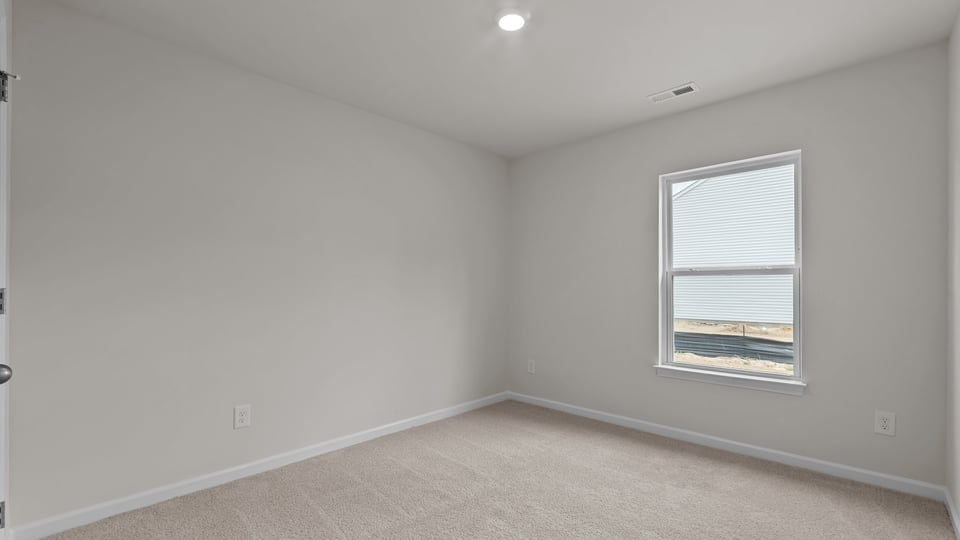 secondary bedroom with window