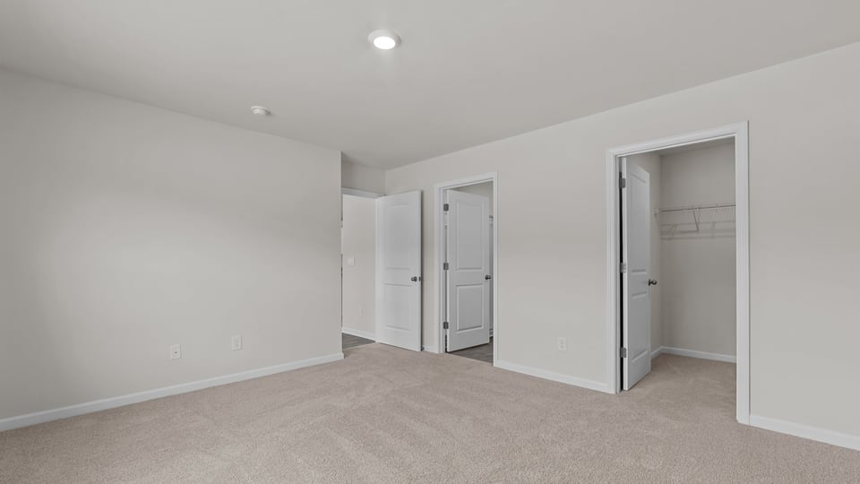 primary bedroom with en suite bathroom