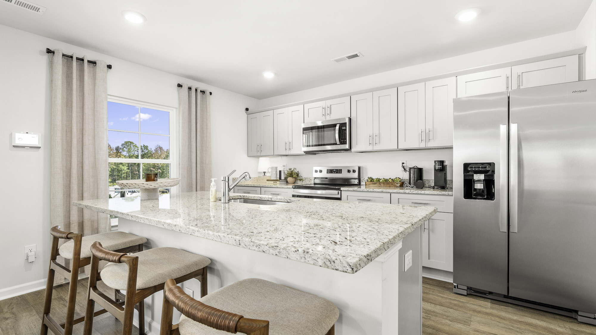 kitchen with a large eat in island