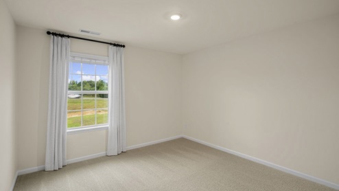 Bedroom with carpet