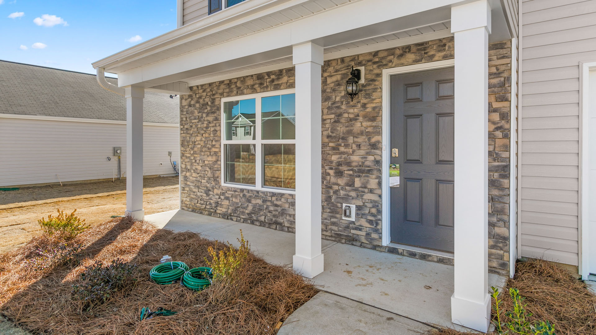 CLOSE UP THE KYLE 2 STORY 4BED 2.5 BATH WITH 2 CAR GARAGE STONE EXTERIOR