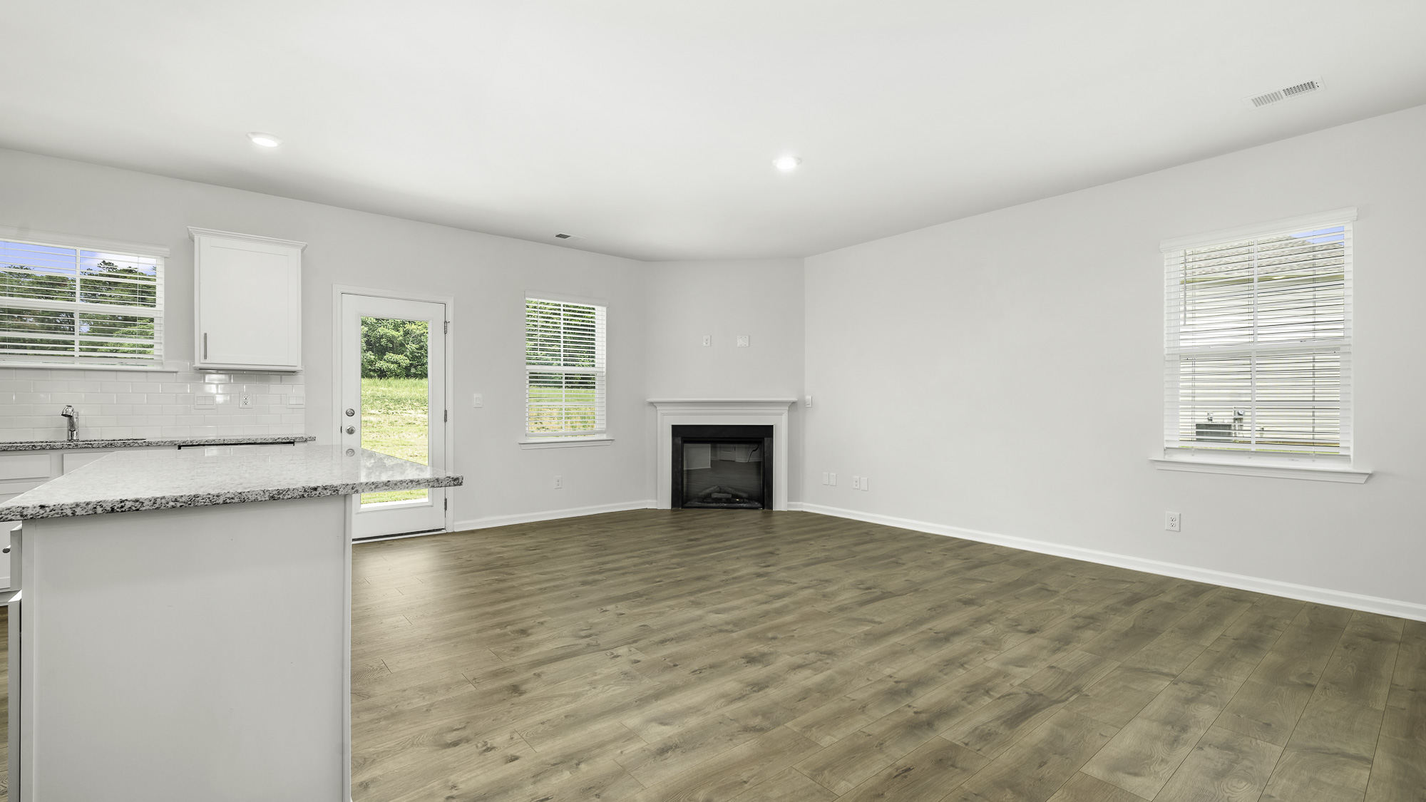 side view of kitchen and fire place