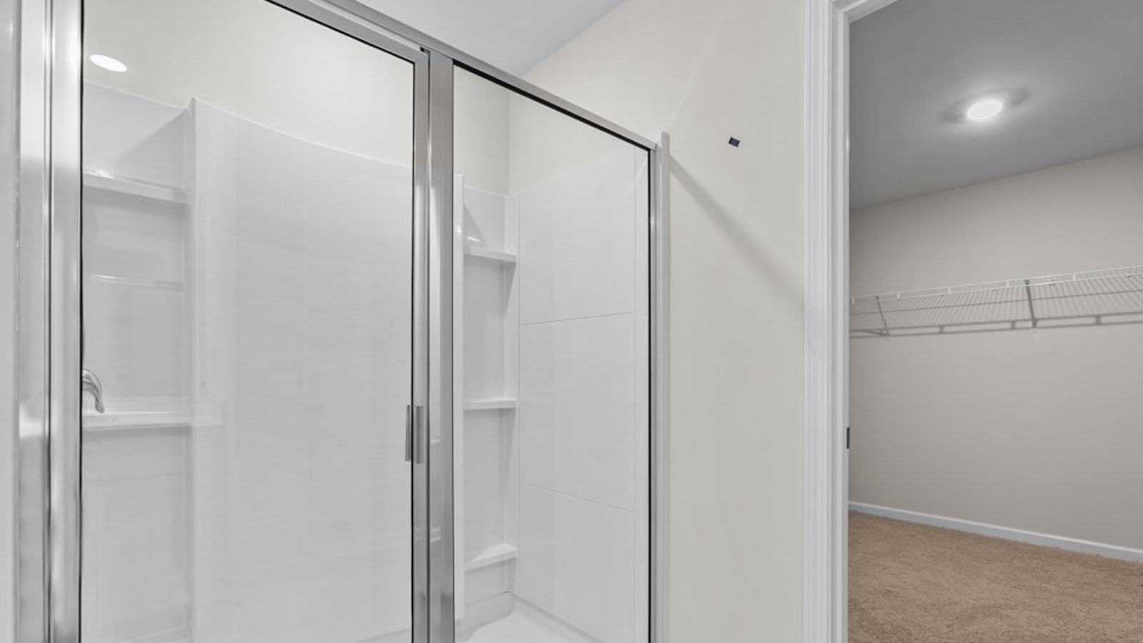 main bedroom with walk in shower