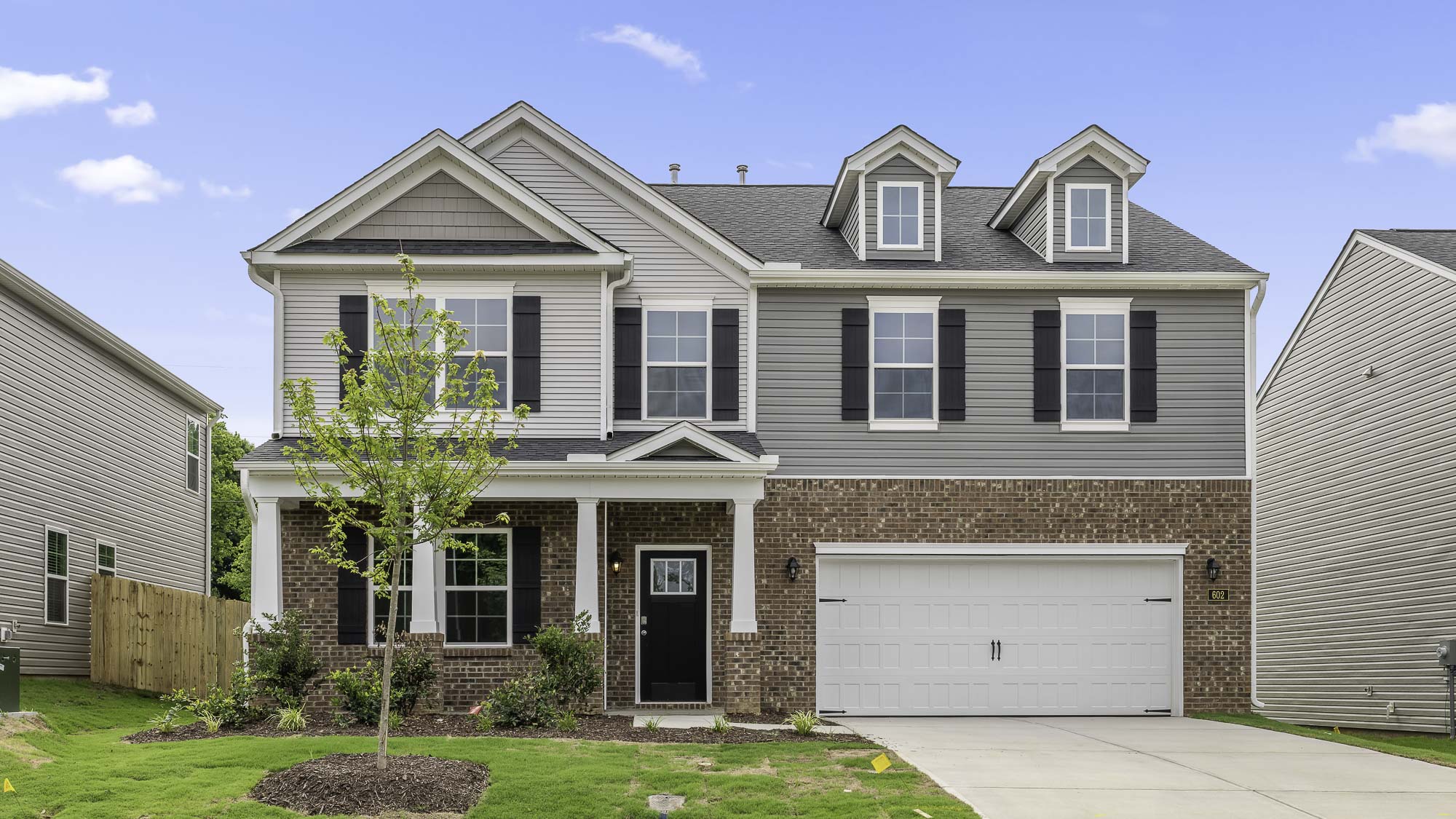 The Columbia featured at The Preserve at Kinsley offers a 2 story 2 car garage 4 bedroom 3 full bathrooms 1 half bath single family home