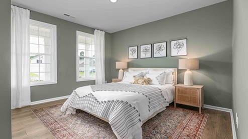bedroom on first floor with wood