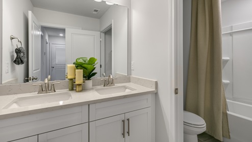 bathroom with tub shower combo