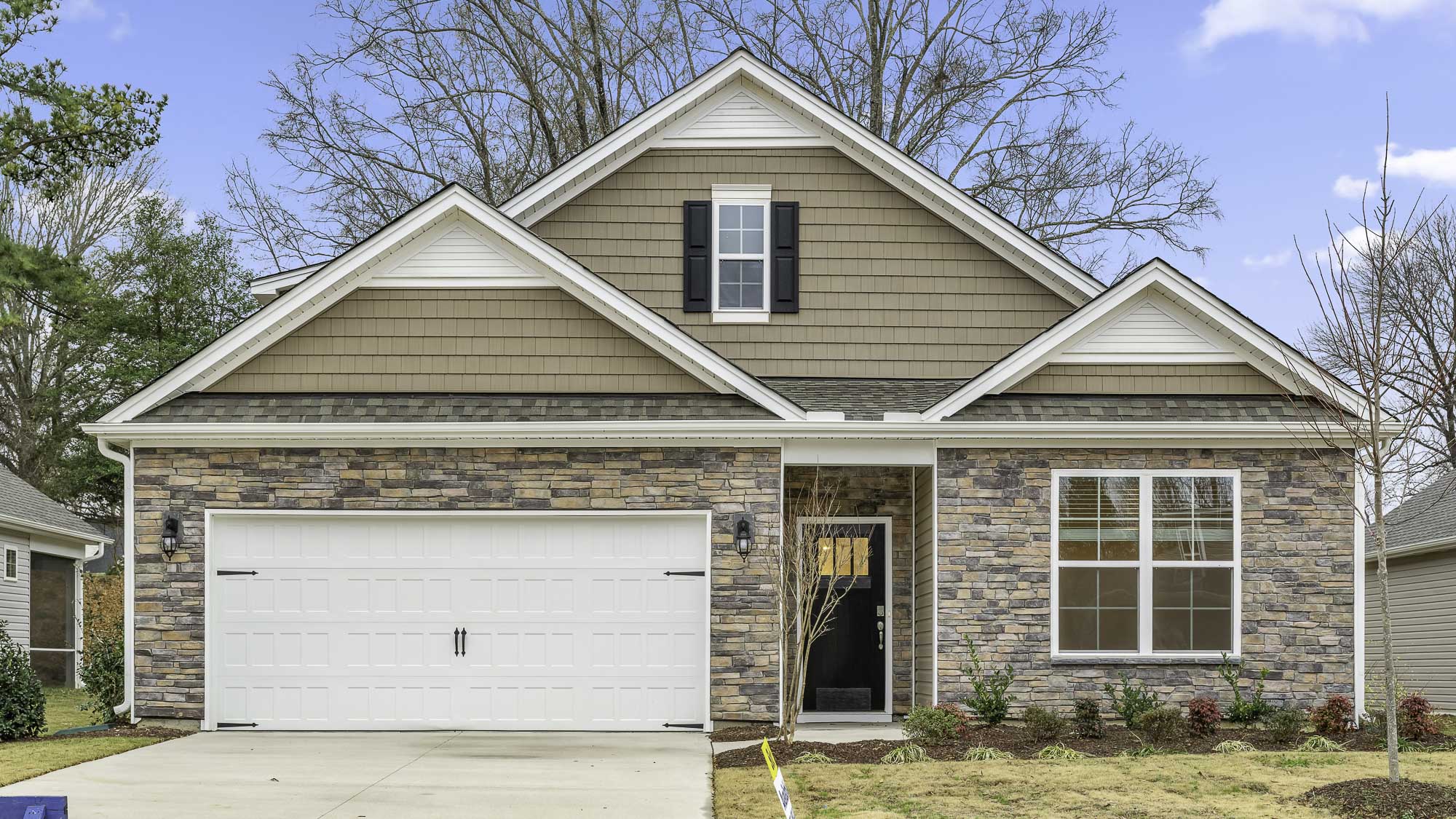The Dover features a 1.2 story 2 car garage 4 bed 3 bath single family home