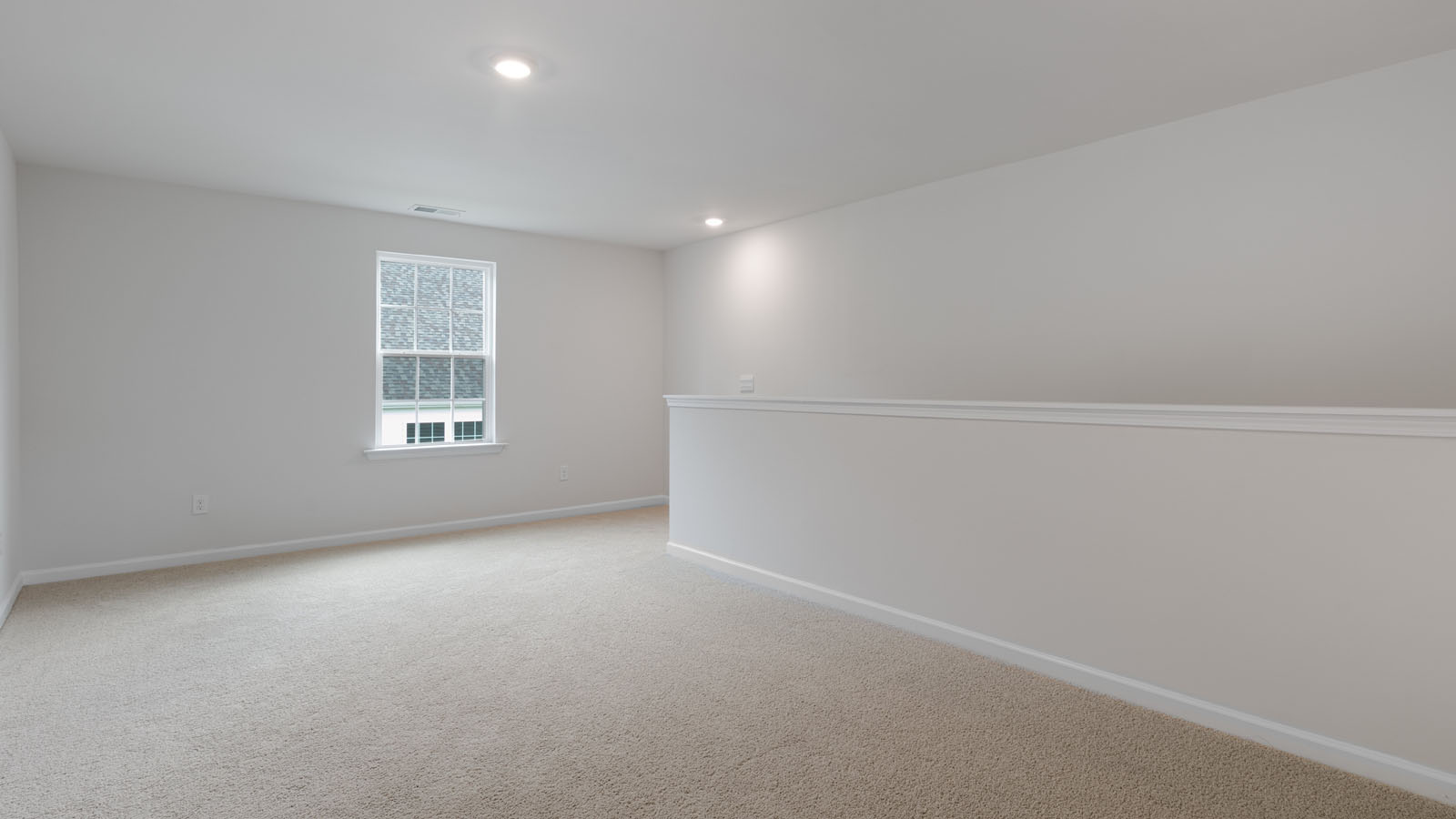 additional view of loft with window