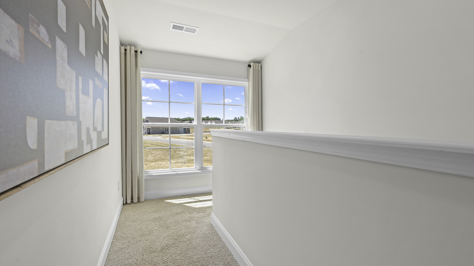 view of window off the top of the stairway