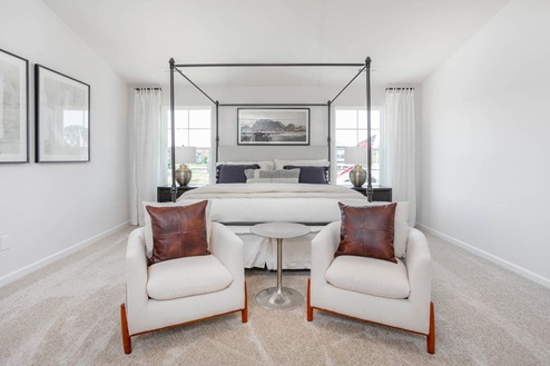bedroom with carpet and natural light