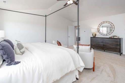 bedroom with carpet and natural light