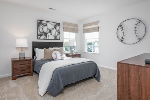 bedroom with carpet and natural light