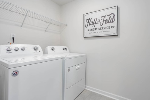 laundry room with shelfs