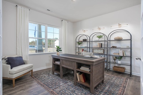 office with French doors and revwood floor
