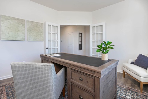 office with French doors and revwood floor