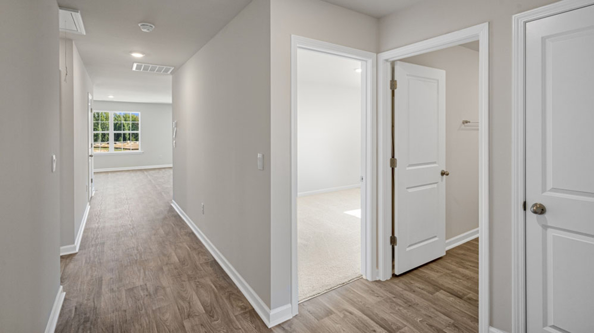 hallway with vinyl floor