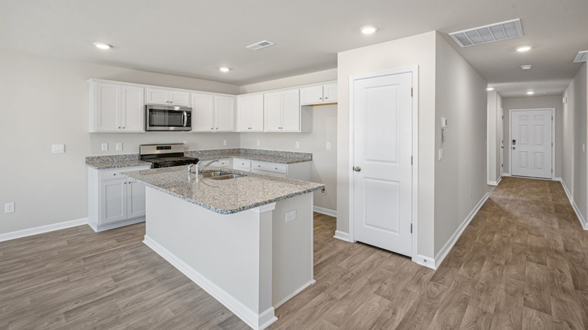 kitchen with vinyl floor and natural light