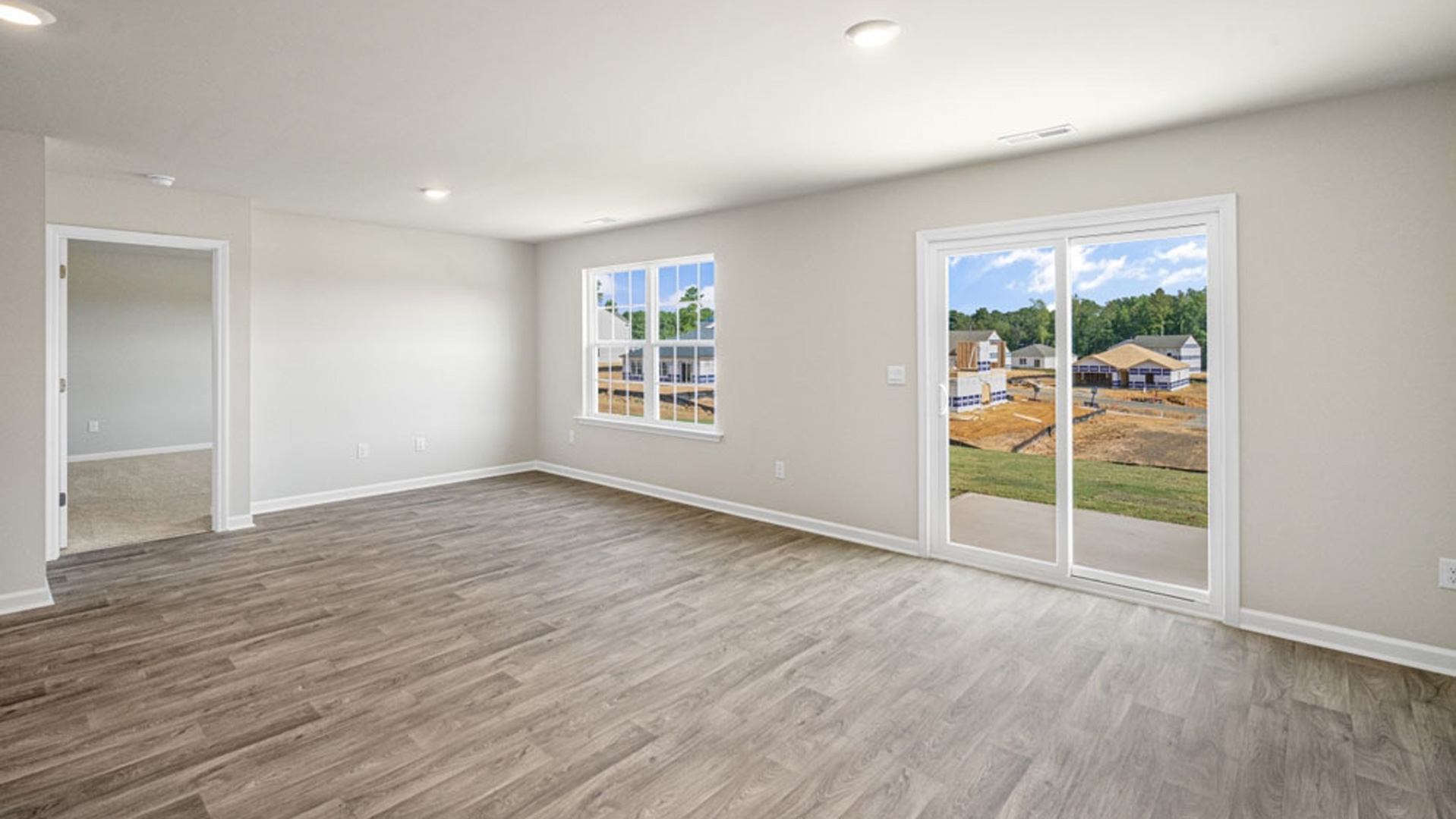 living room with vinyl floor and sliding glass door