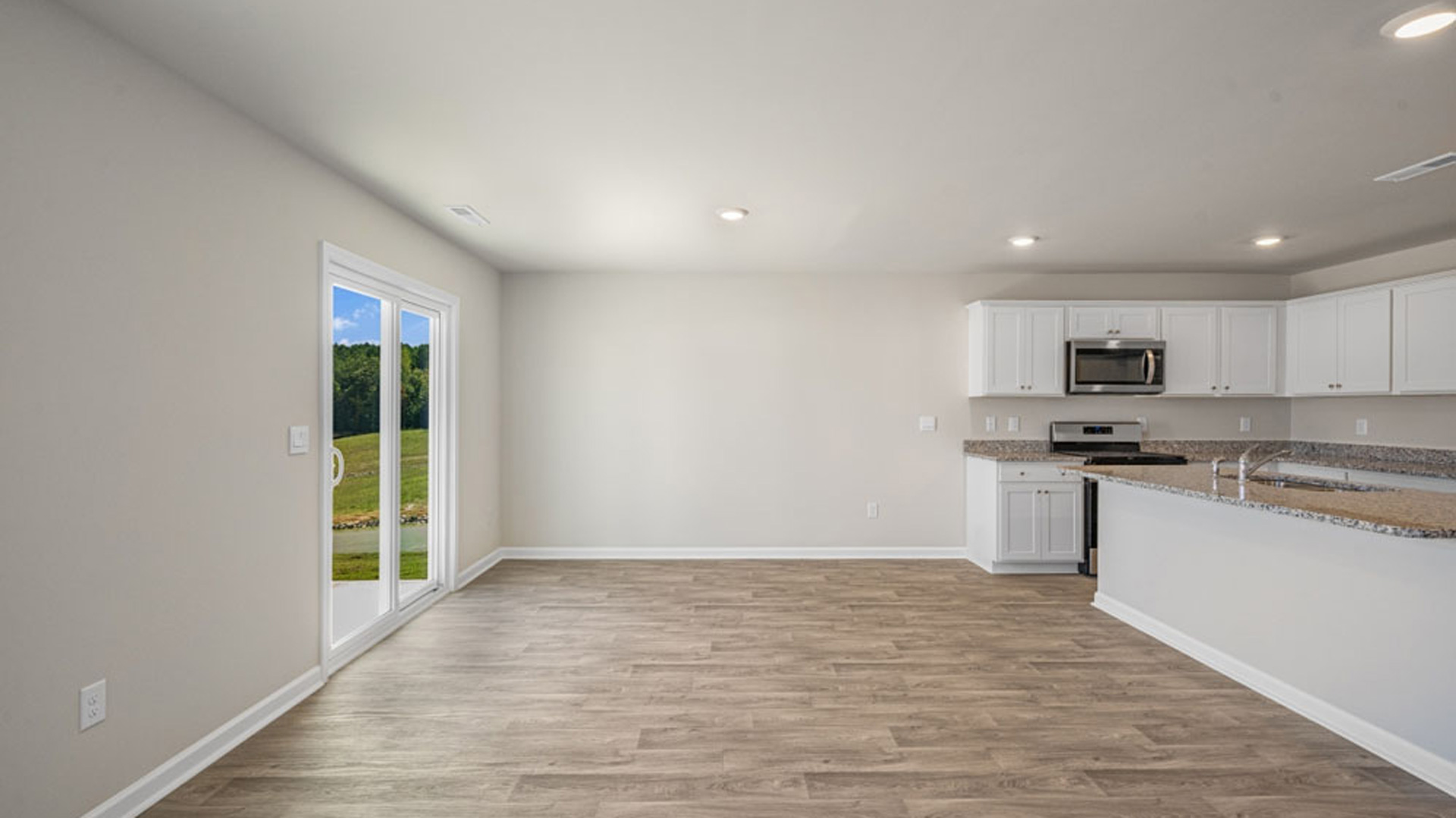 dining area with vinyl floor and sliding glass door