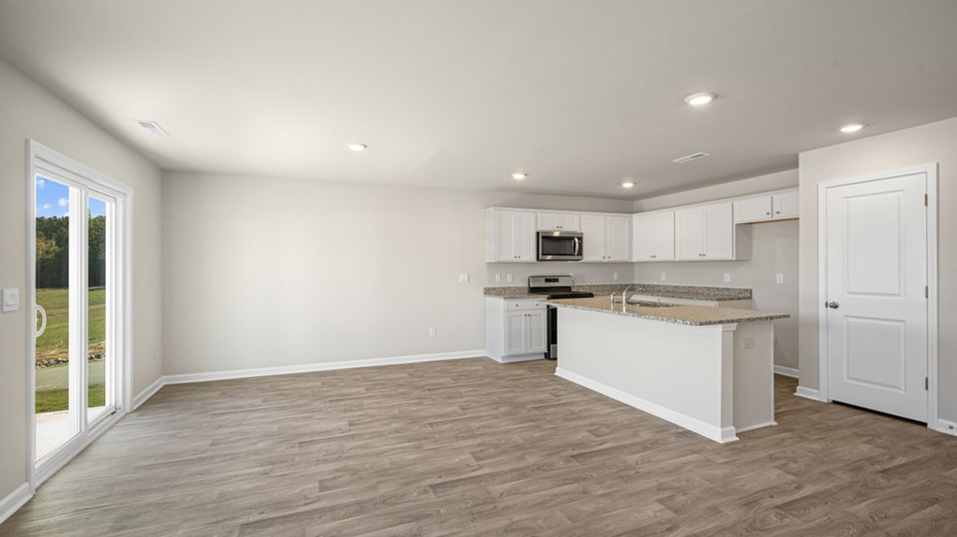 dining area with vinyl floor and sliding glass door