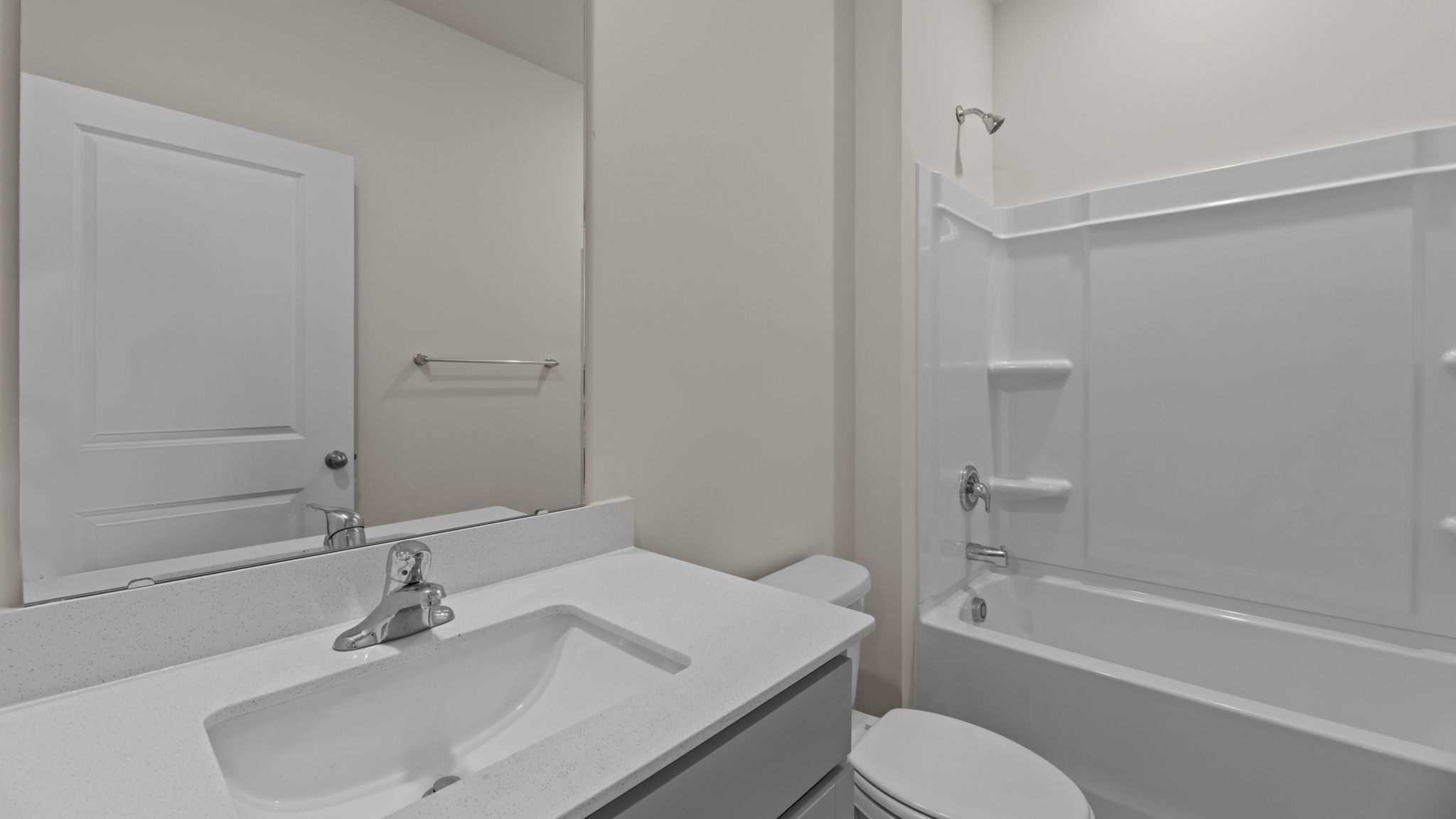 bathroom with tub shower combo