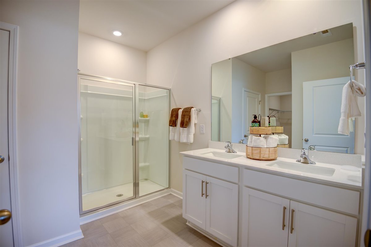 Primary Bathroom with dual vanities