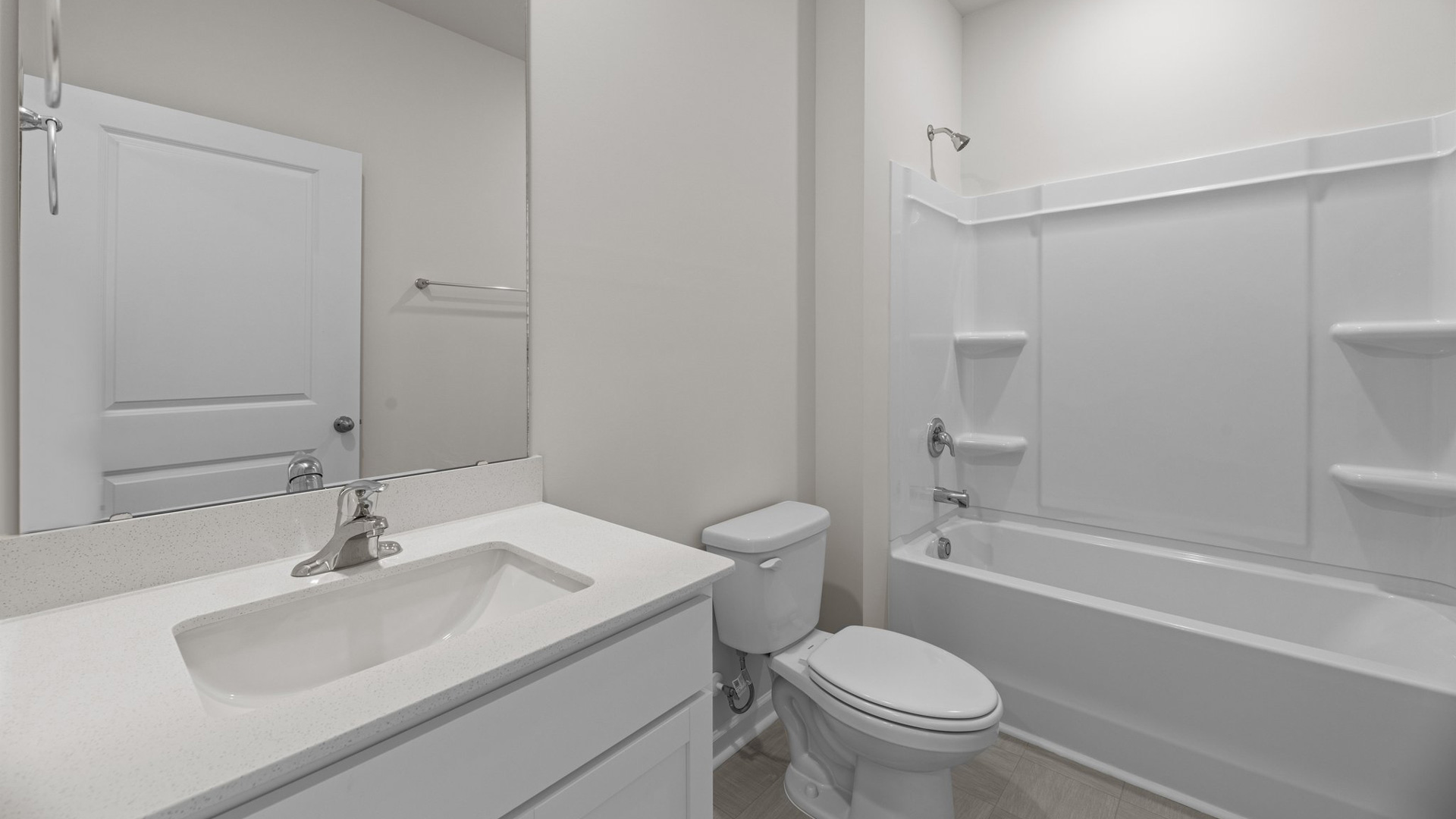 bathroom with tub shower combo