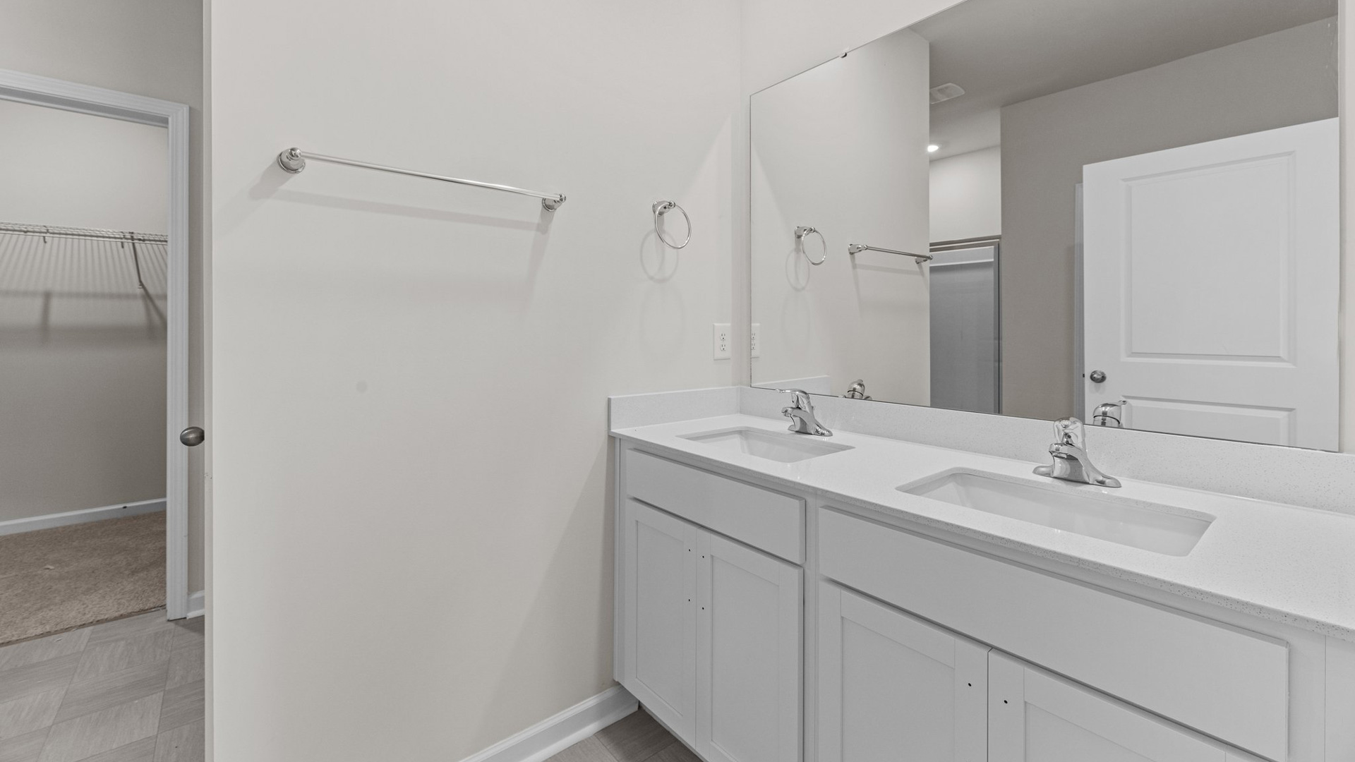 bathroom with dual sinks