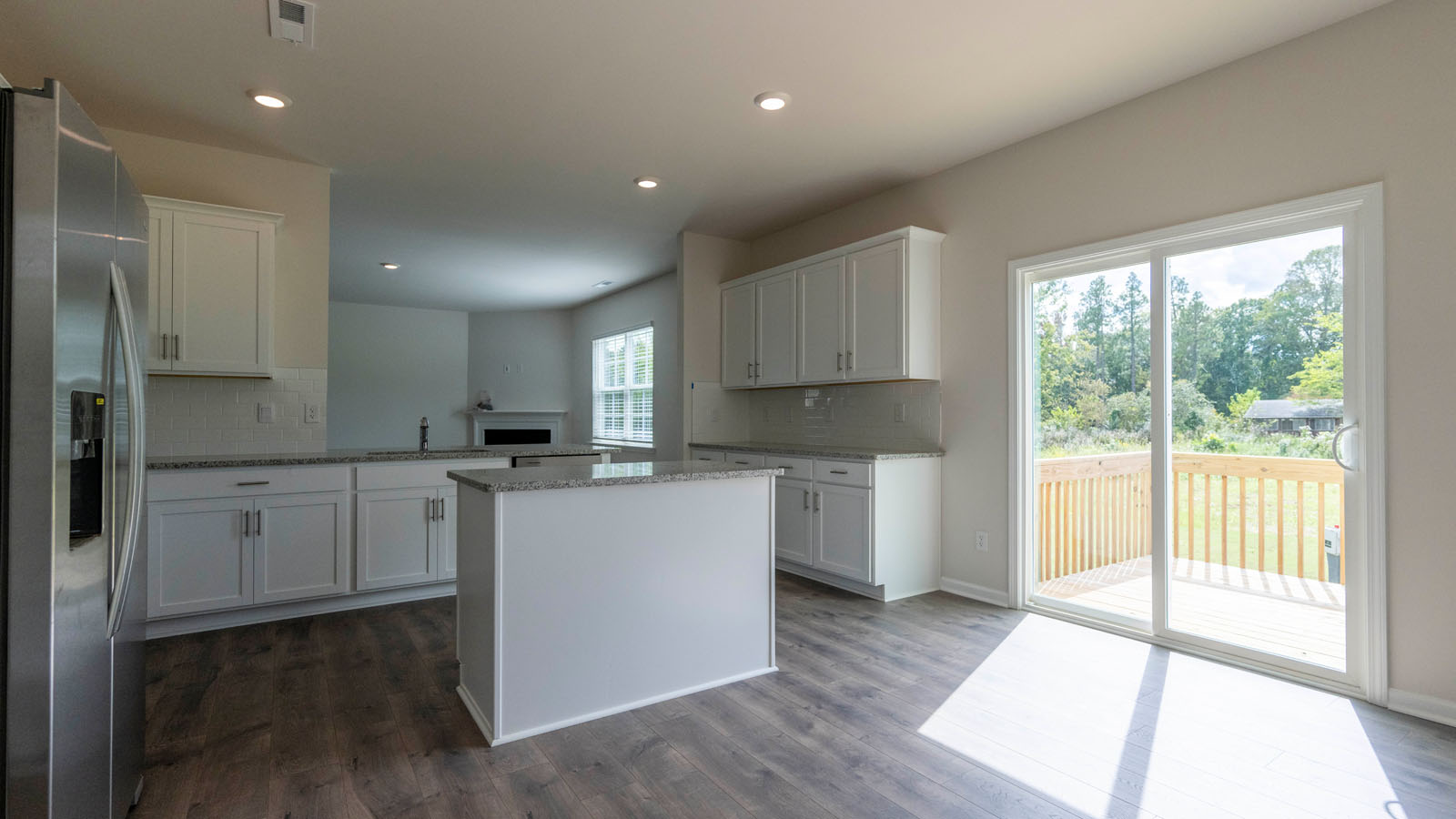 kitchen and breakfast area with patio door