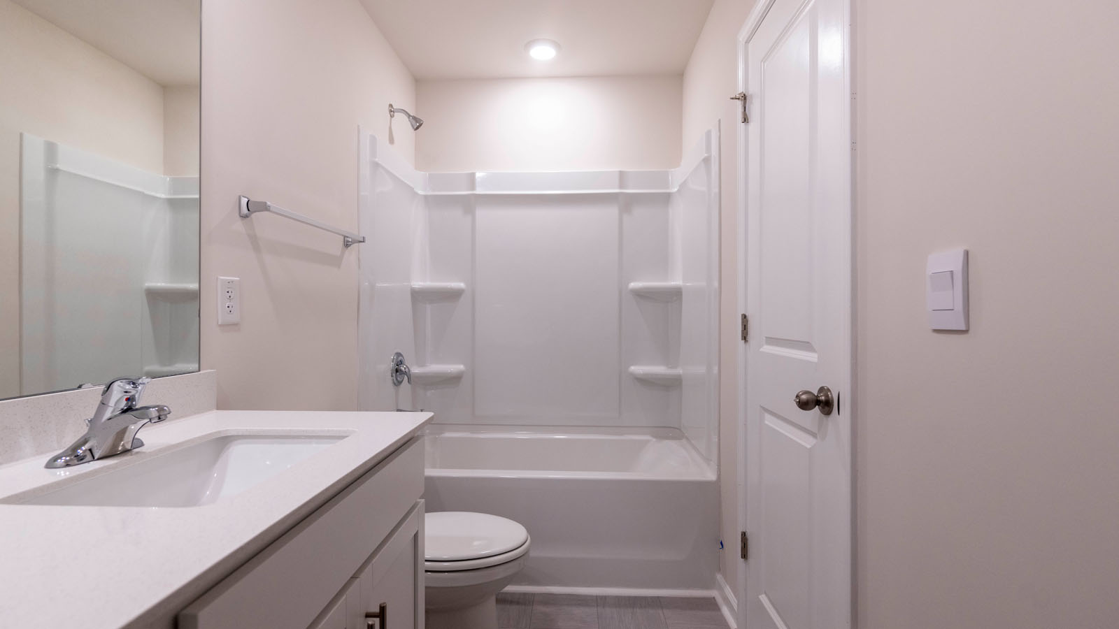 secondary bathroom with tub shower comber