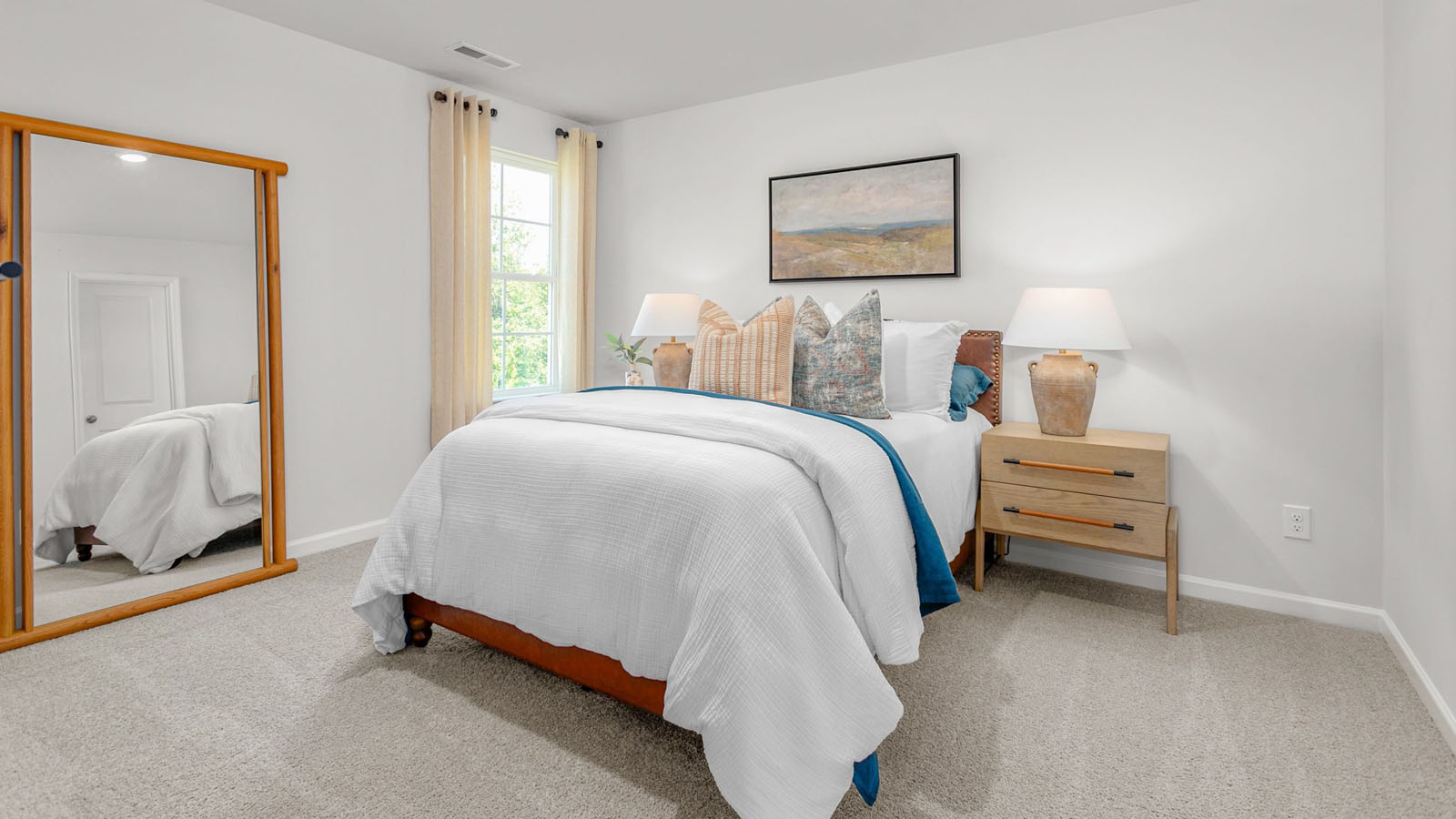 bedroom with carpet and ample light