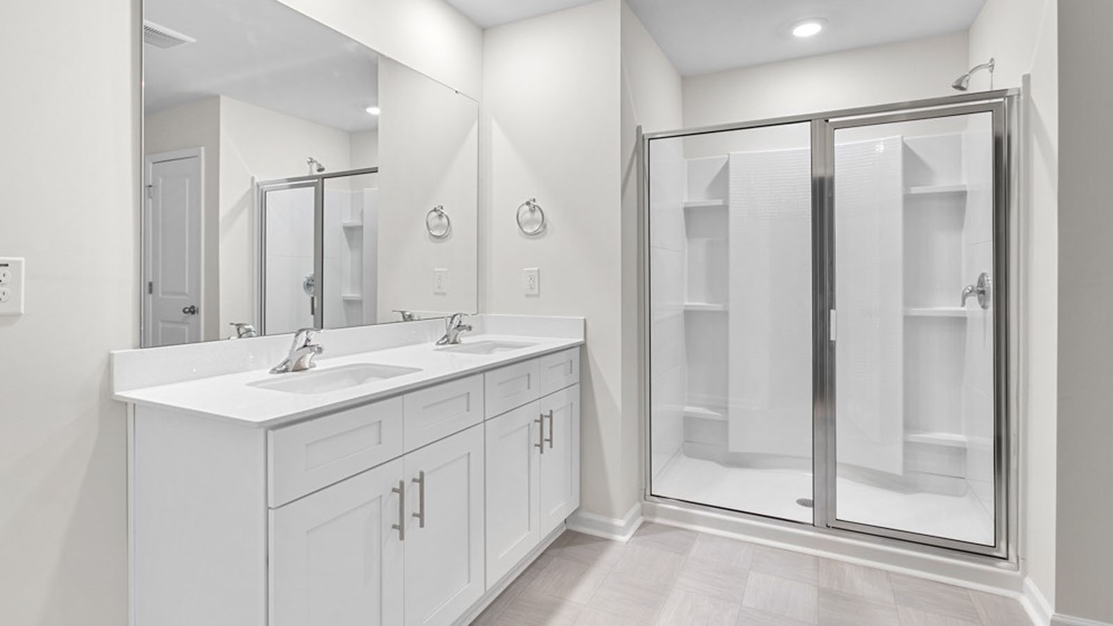 bathroom with dual sinks