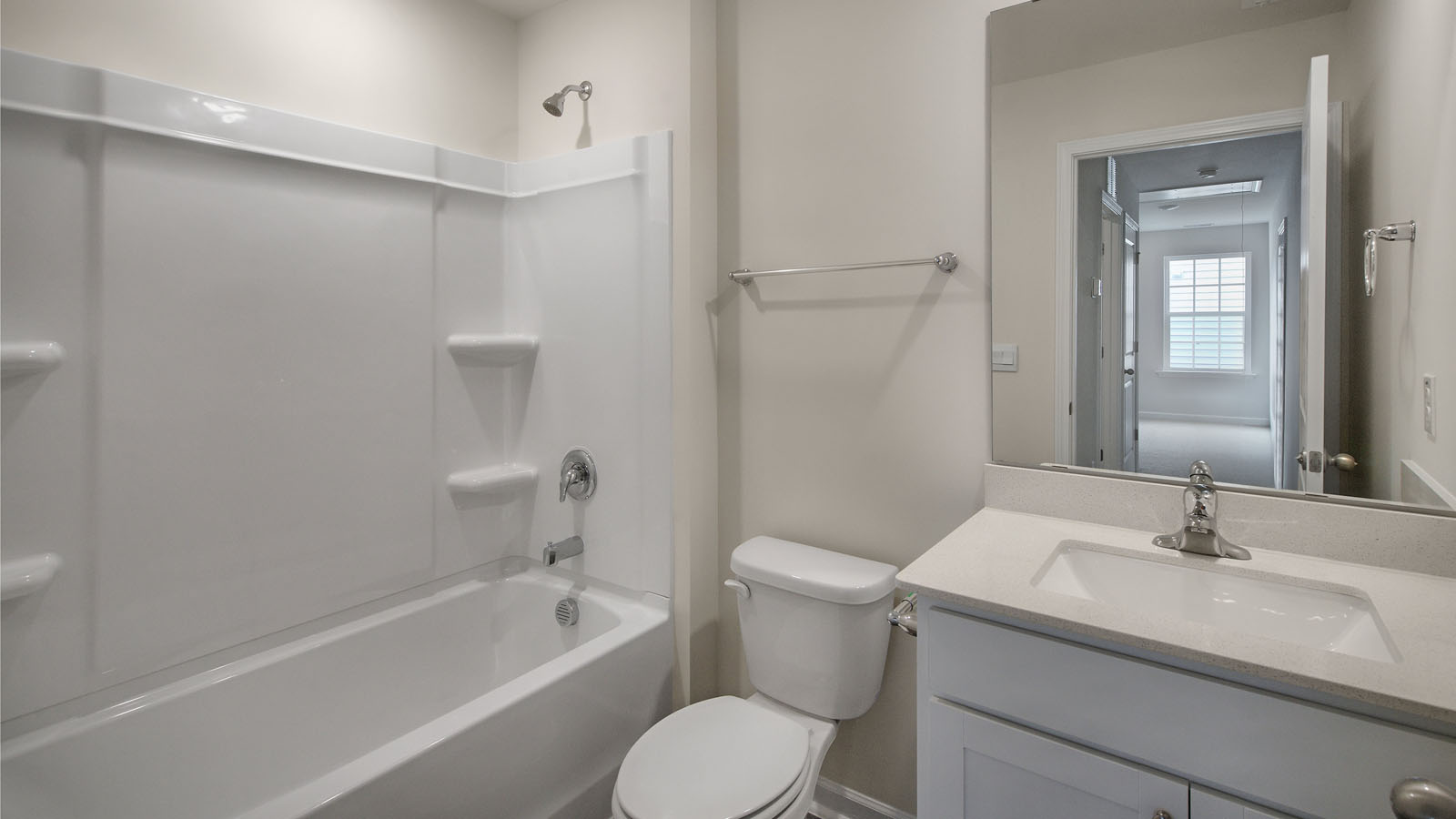 bathroom with tub shower combo