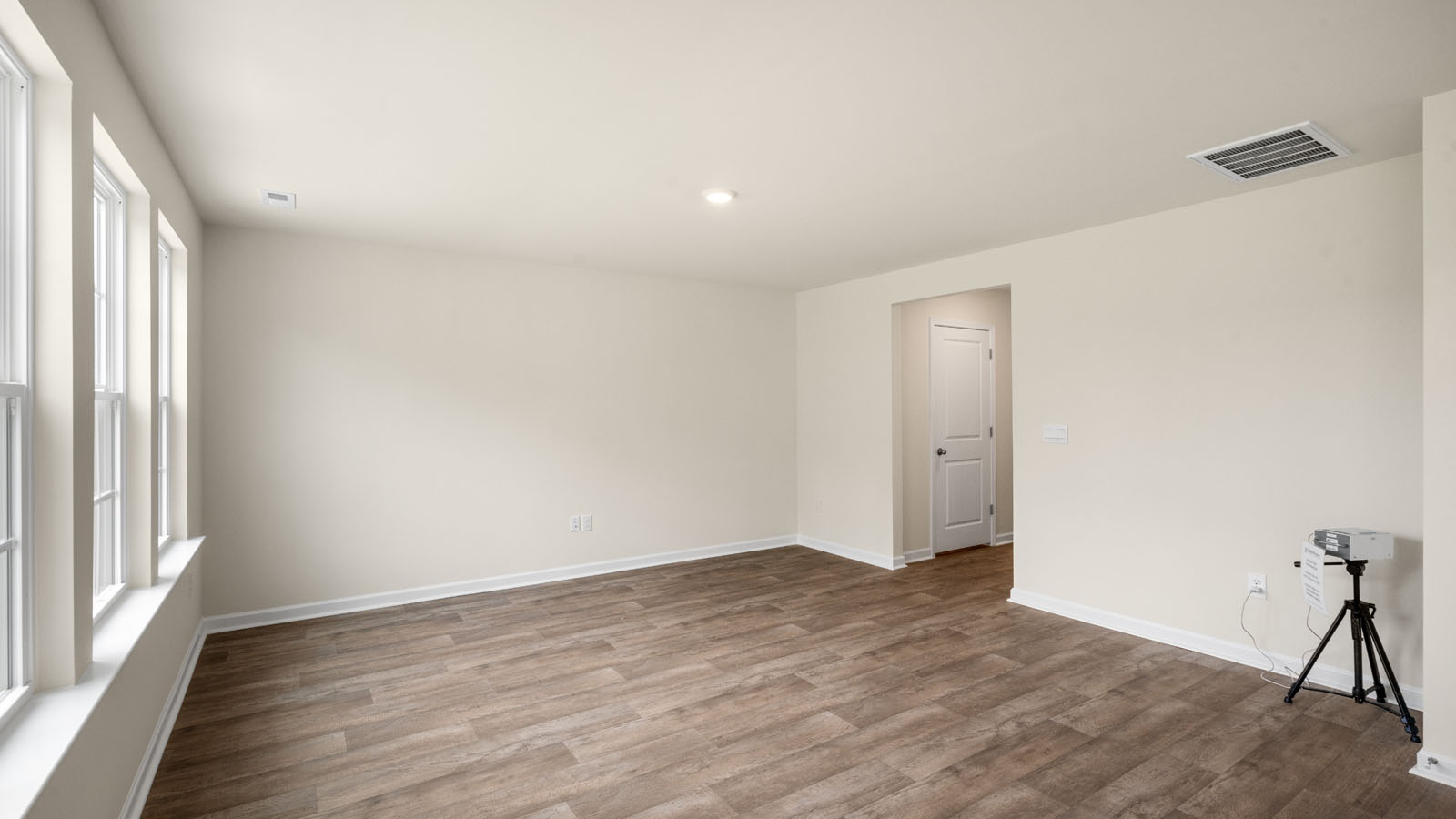 living room with revwood flooring