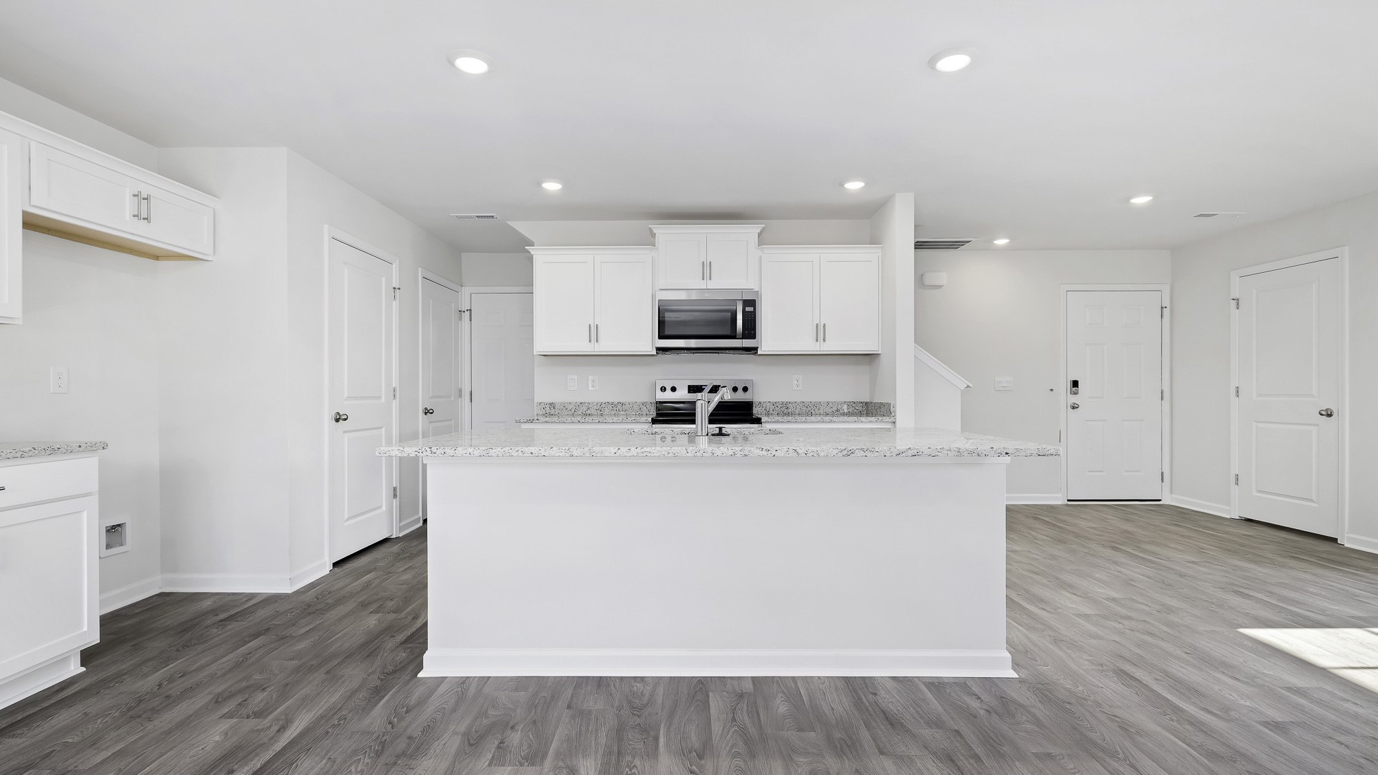 kitchen with white cabinets