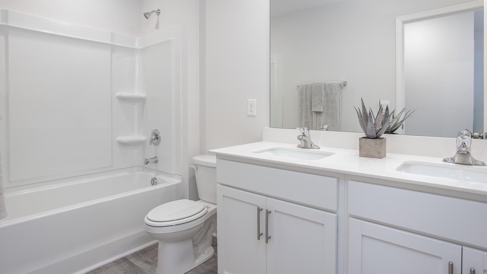 bathroom with tub shower combo