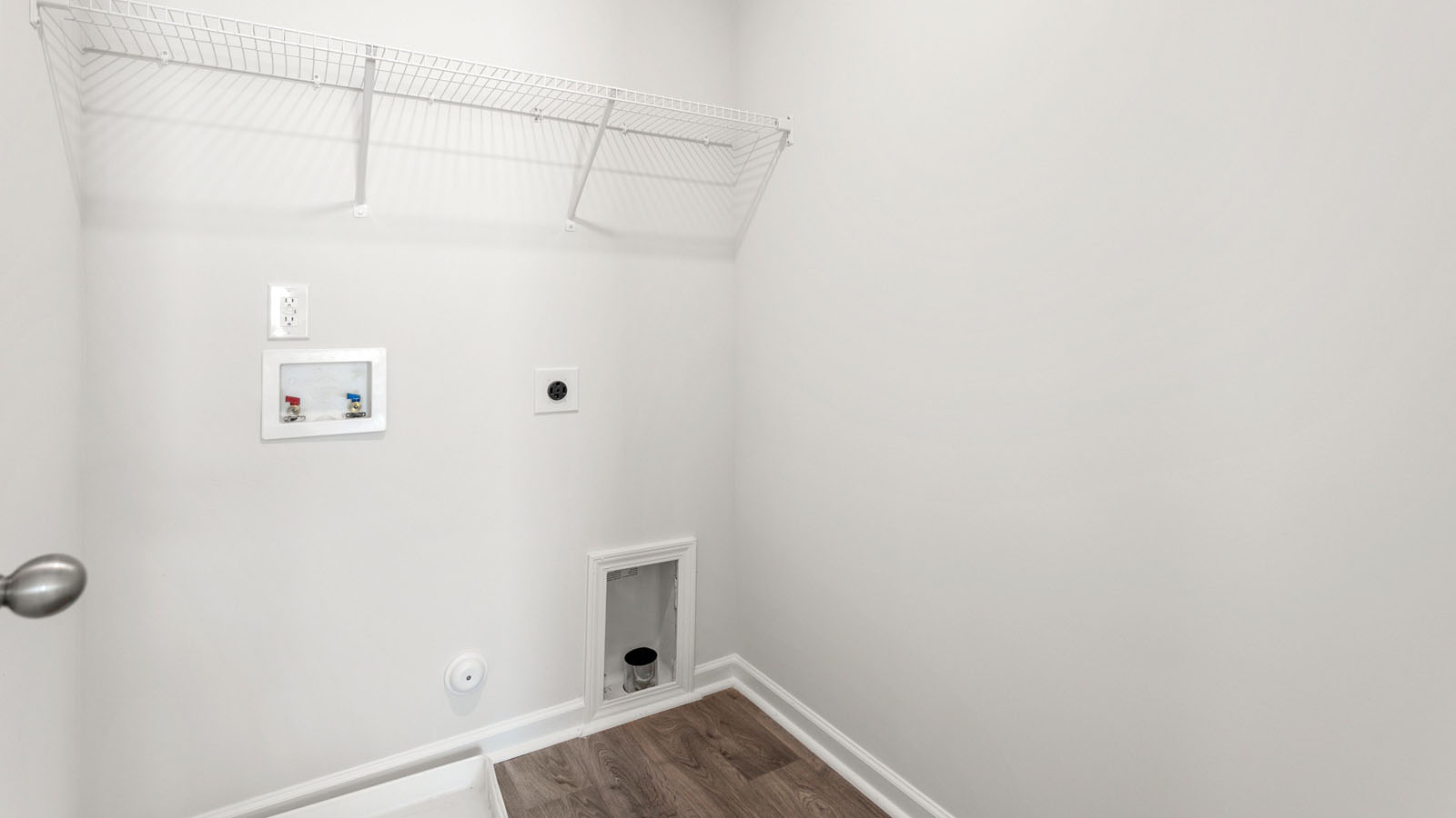 laundry room with wireshelving