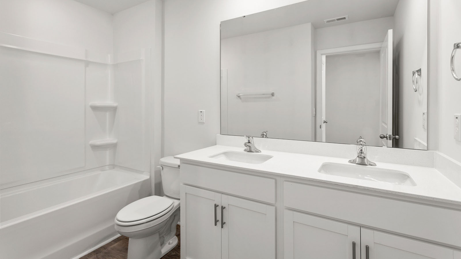 bathroom with dual sinks