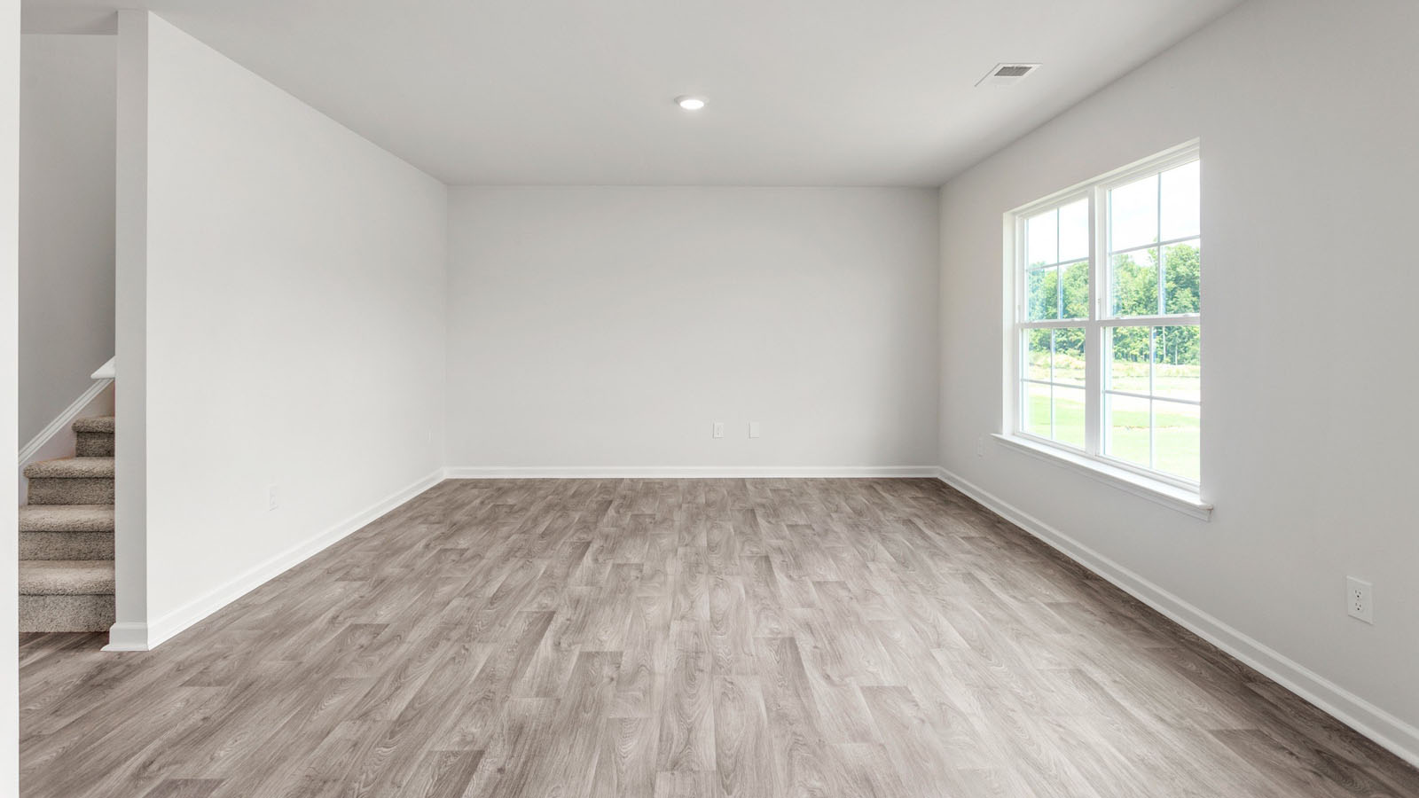 living room with vinyl flooring