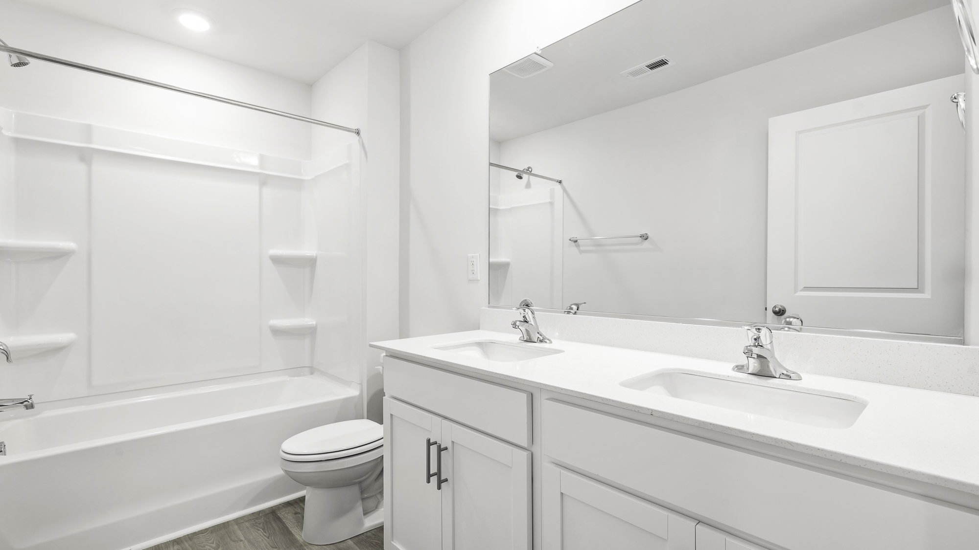 secondary bathroom with tub shower combo