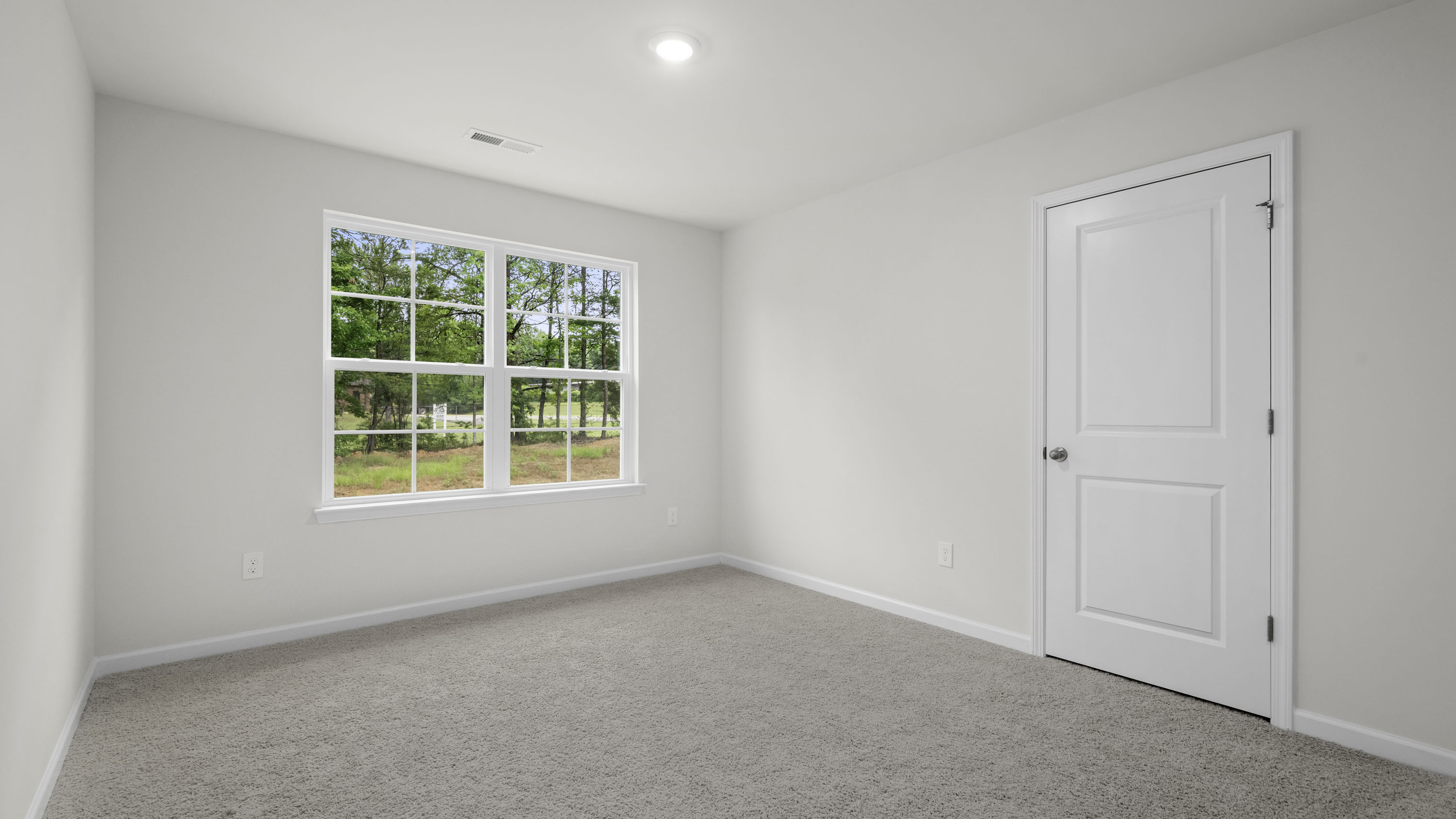 bedroom with 2 windows